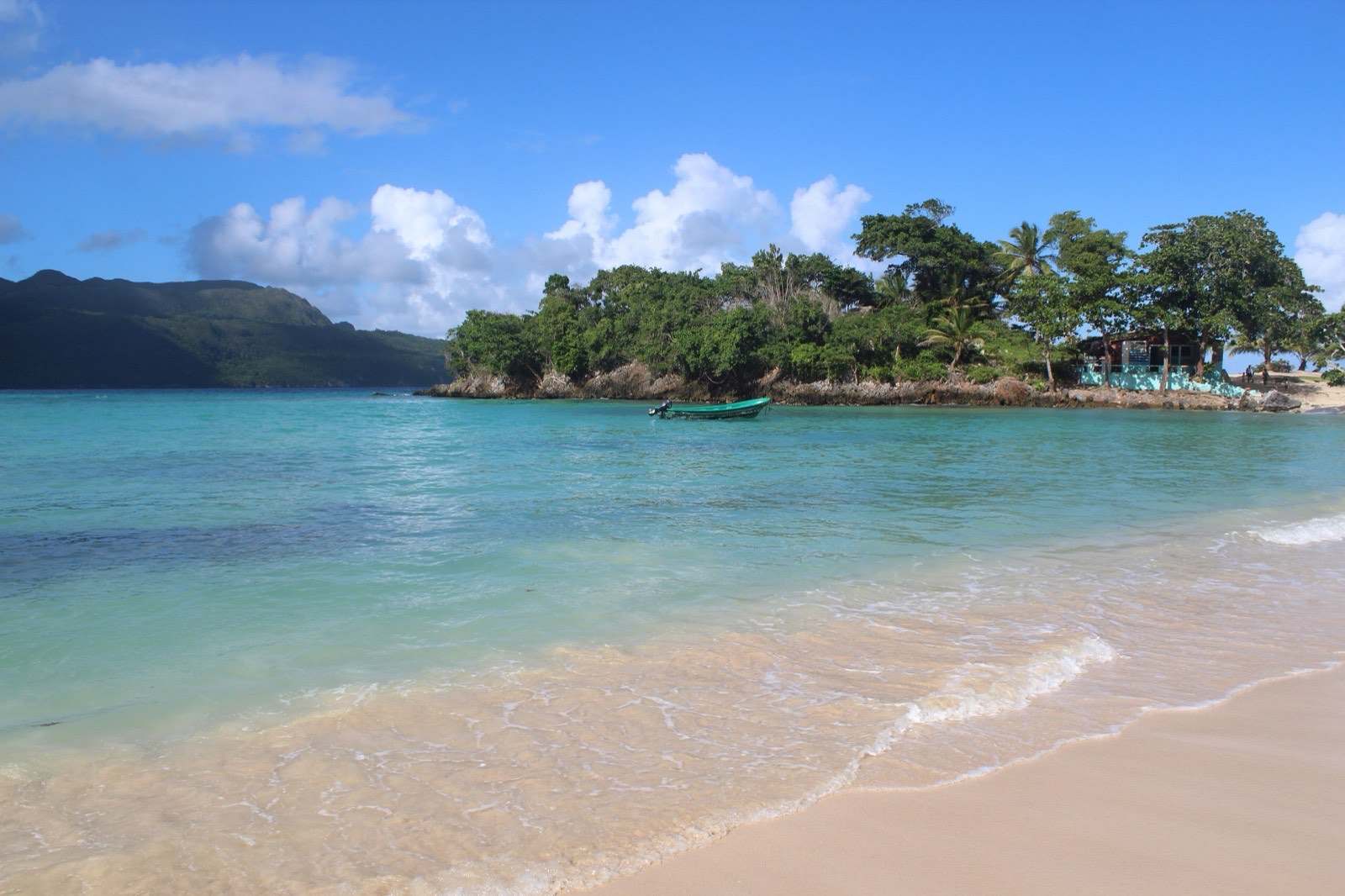 Clear water and green headlands at Playa Rincón, Samaná Peninsula, Dominican Republic